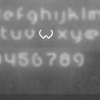 Настенный светильник Artemide Alphabet 1202w00A Настенный светильник Artemide Alphabet 1202w00A