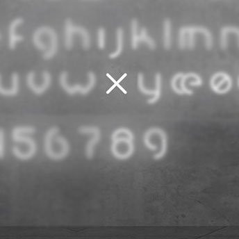 Настенный светильник Artemide Alphabet 1202x00A Настенный светильник Artemide Alphabet 1202x00A