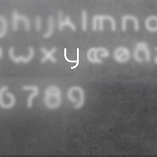 Настенный светильник Artemide Alphabet 1202y00A