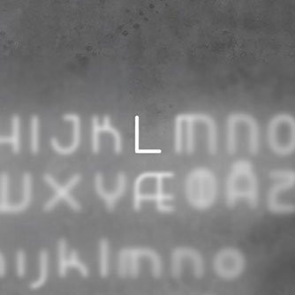 Настенный светильник Artemide Alphabet 1211L00A + supp