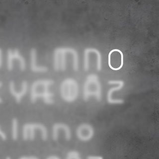 Настенный светильник Artemide Alphabet 1211O00A + supp