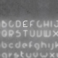 Настенный светильник Artemide Alphabet 1201E00A