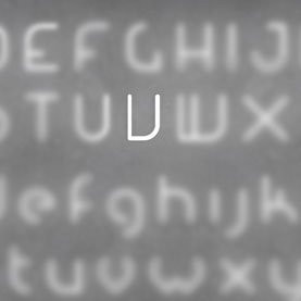 Настенный светильник Artemide Alphabet 1201V00A Настенный светильник Artemide Alphabet 1201V00A