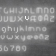 Настенный светильник Artemide Alphabet 1201Y00A Настенный светильник Artemide Alphabet 1201Y00A