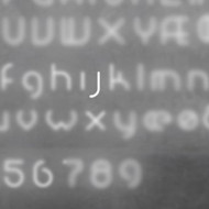 Настенный светильник Artemide Alphabet 1202j00A Настенный светильник Artemide Alphabet 1202j00A