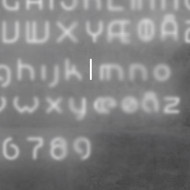 Настенный светильник Artemide Alphabet 1202l00A Настенный светильник Artemide Alphabet 1202l00A