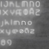 Настенный светильник Artemide Alphabet 1202n00A Настенный светильник Artemide Alphabet 1202n00A